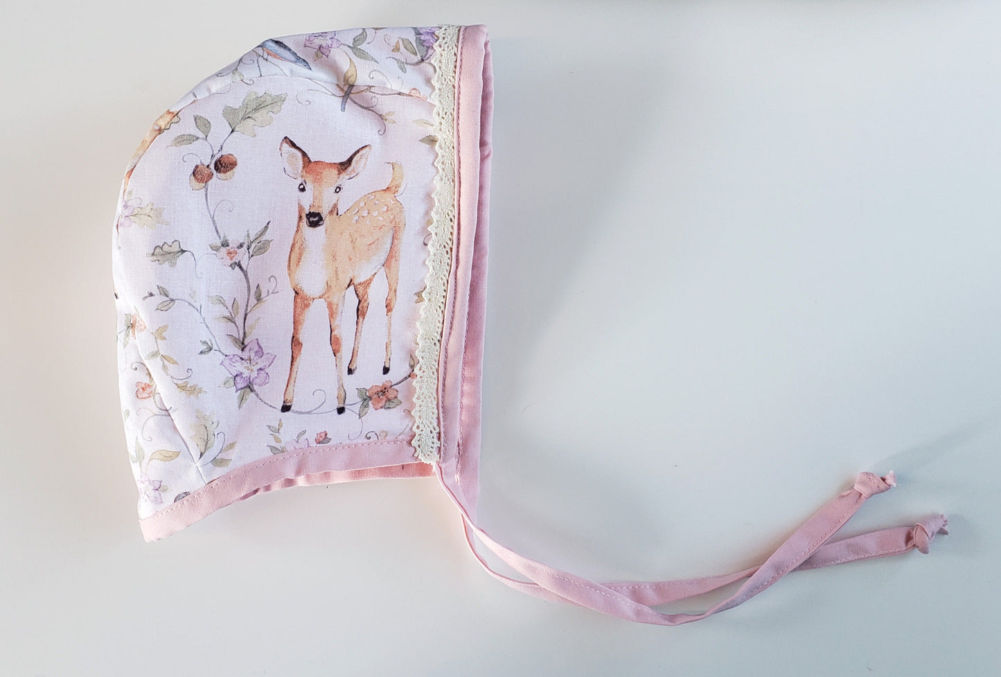 woodland animal baby girl bubble romper- a sweet baby shower gift or coming home outfit, features foxes, deer, birds and squirrels