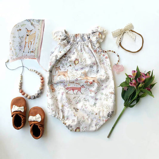 woodland animal baby girl bubble romper- a sweet baby shower gift or coming home outfit, features foxes, deer, birds and squirrels